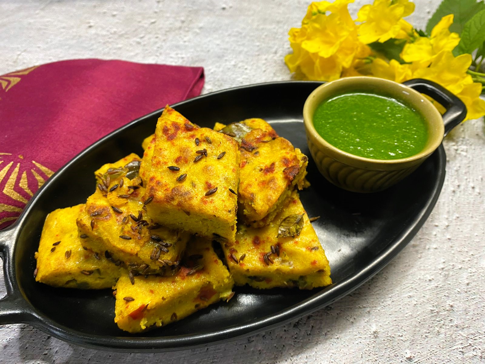 Steamed Gujarati Moong Dal Dhokla with Mustard Seeds