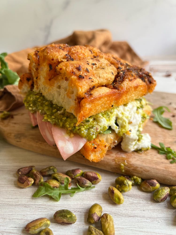 Pistachio Pesto Croissant Sandwich with Arugula and Goat Cheese
