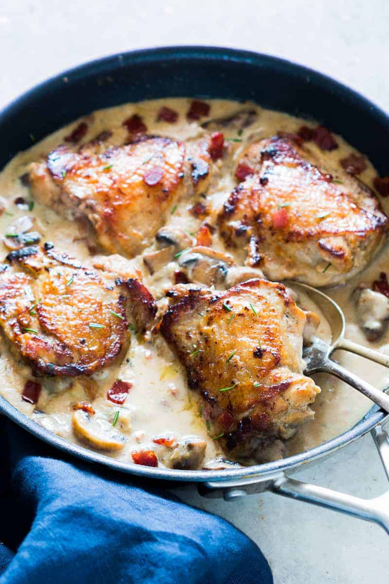 Bacon-Wrapped Chicken Thighs with Creamy Mushroom Sauce