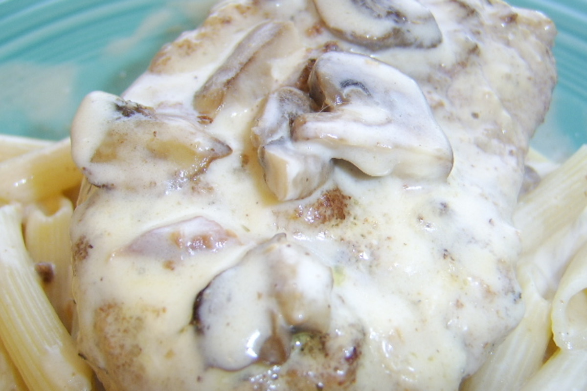 Pan-Seared Pork Medallions with Creamy Mushroom Fettuccine