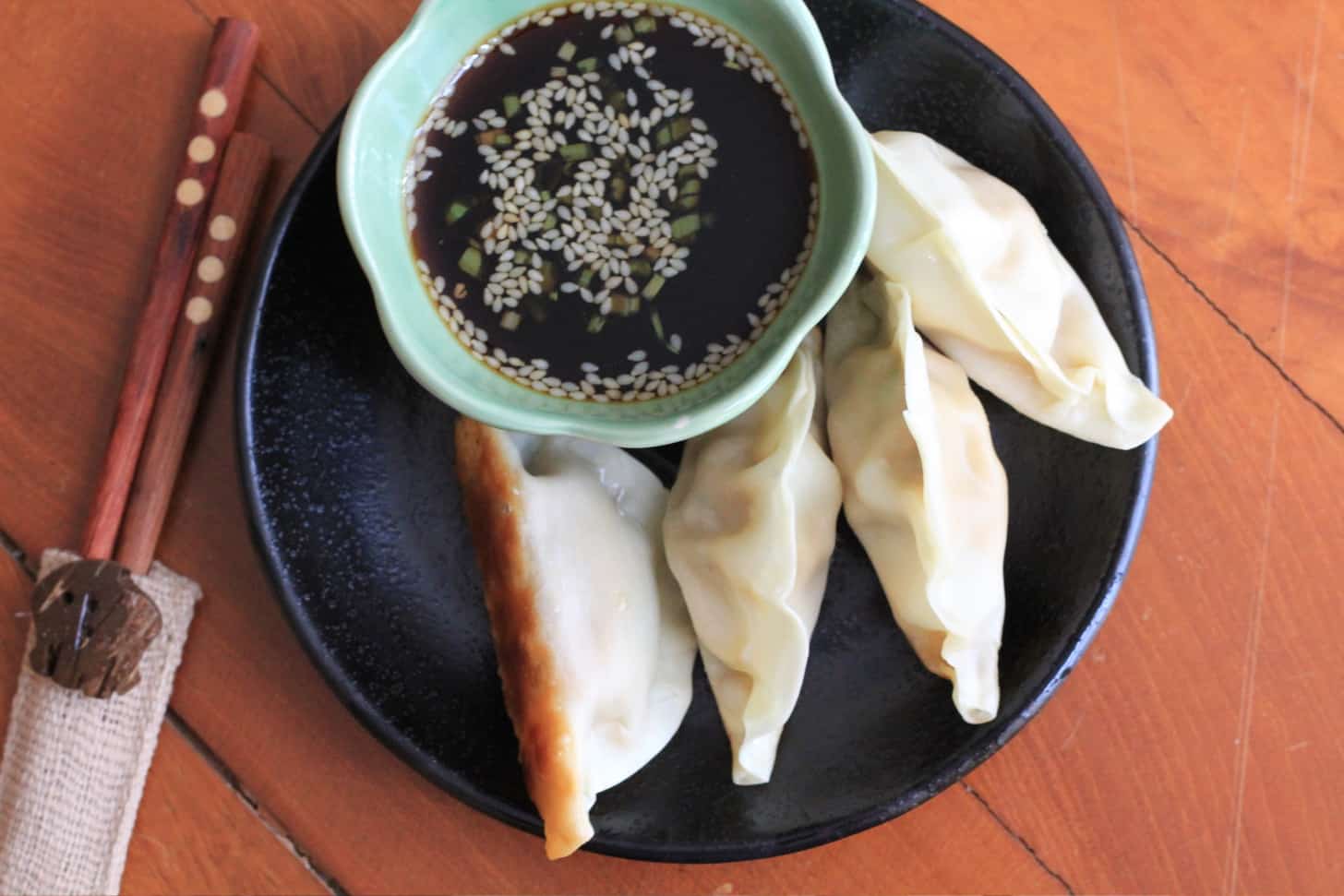 Pan-Fried Pork and Cabbage Gyoza with Ginger Soy Dipping Sauce