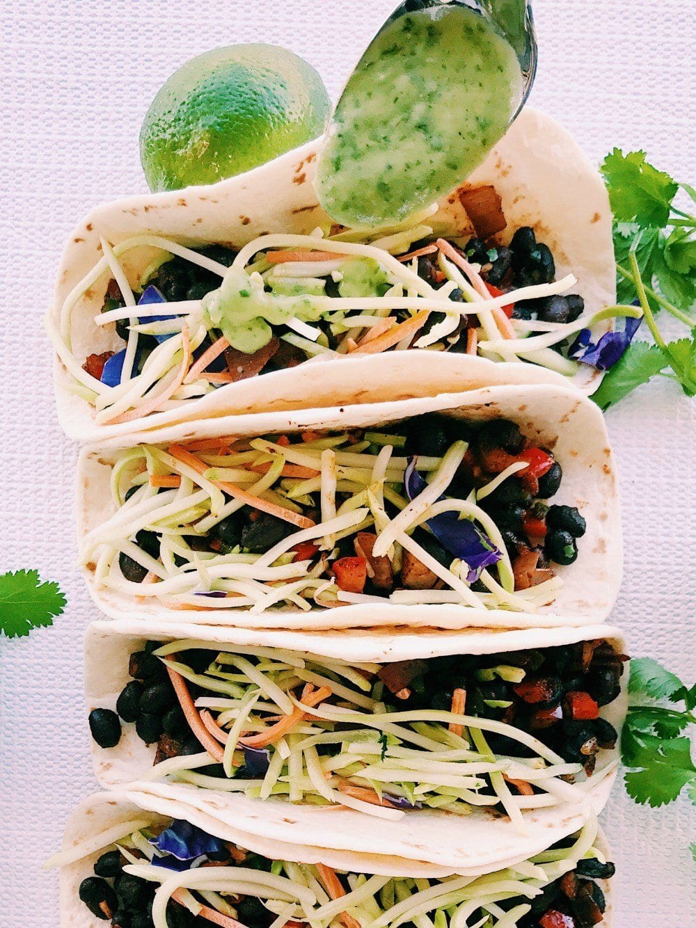 Spicy Avocado and Black Bean Tacos with Cilantro Lime Slaw