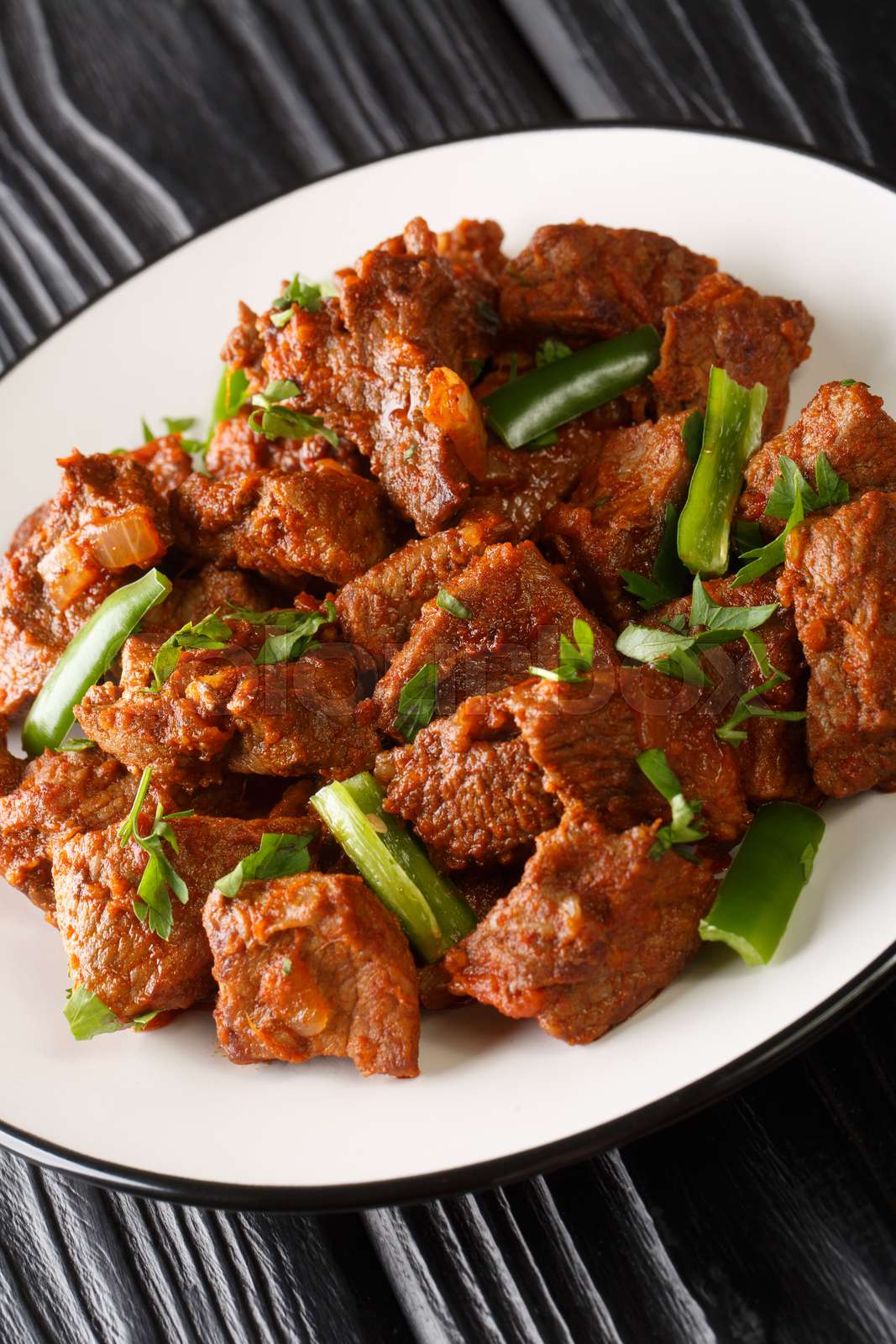 Ethiopian Spiced Chicken Tibs with Berbere and Red Wine Reduction
