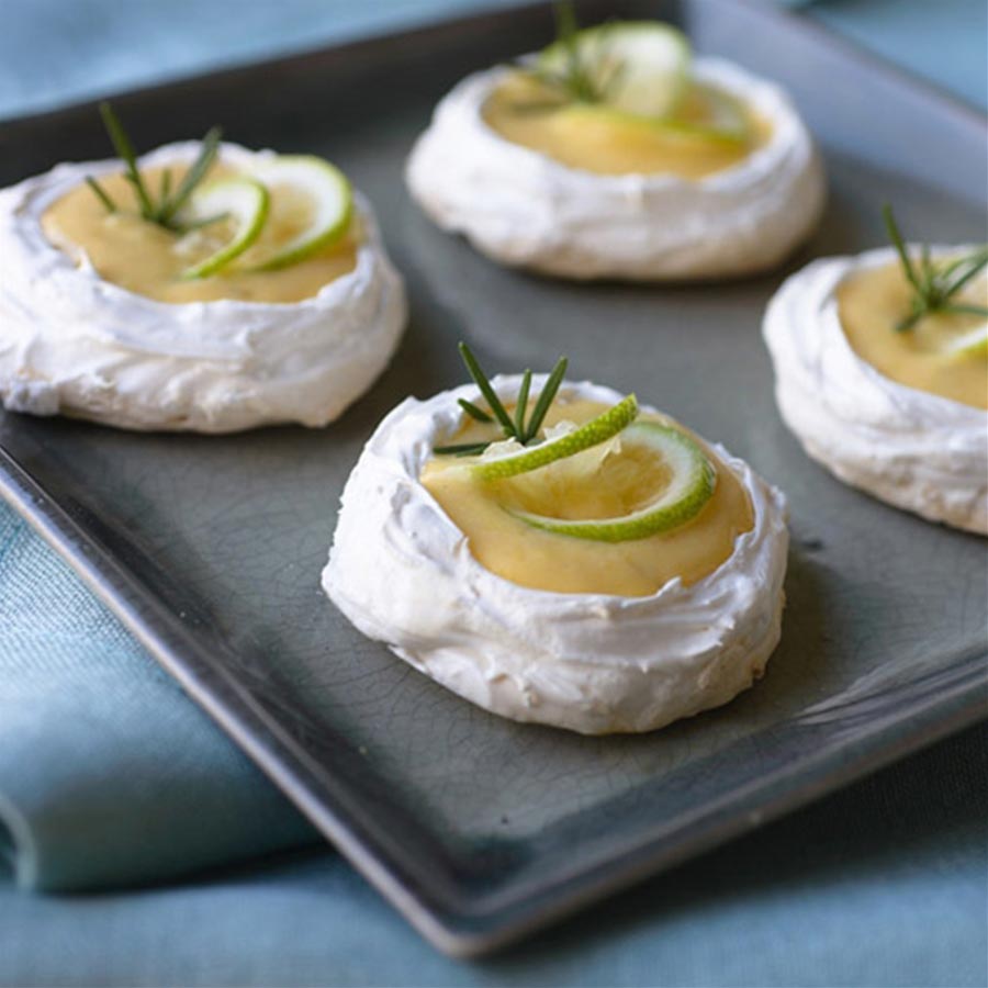 High-Stacked Tropical Fruit Pavlova with Passionfruit Cream