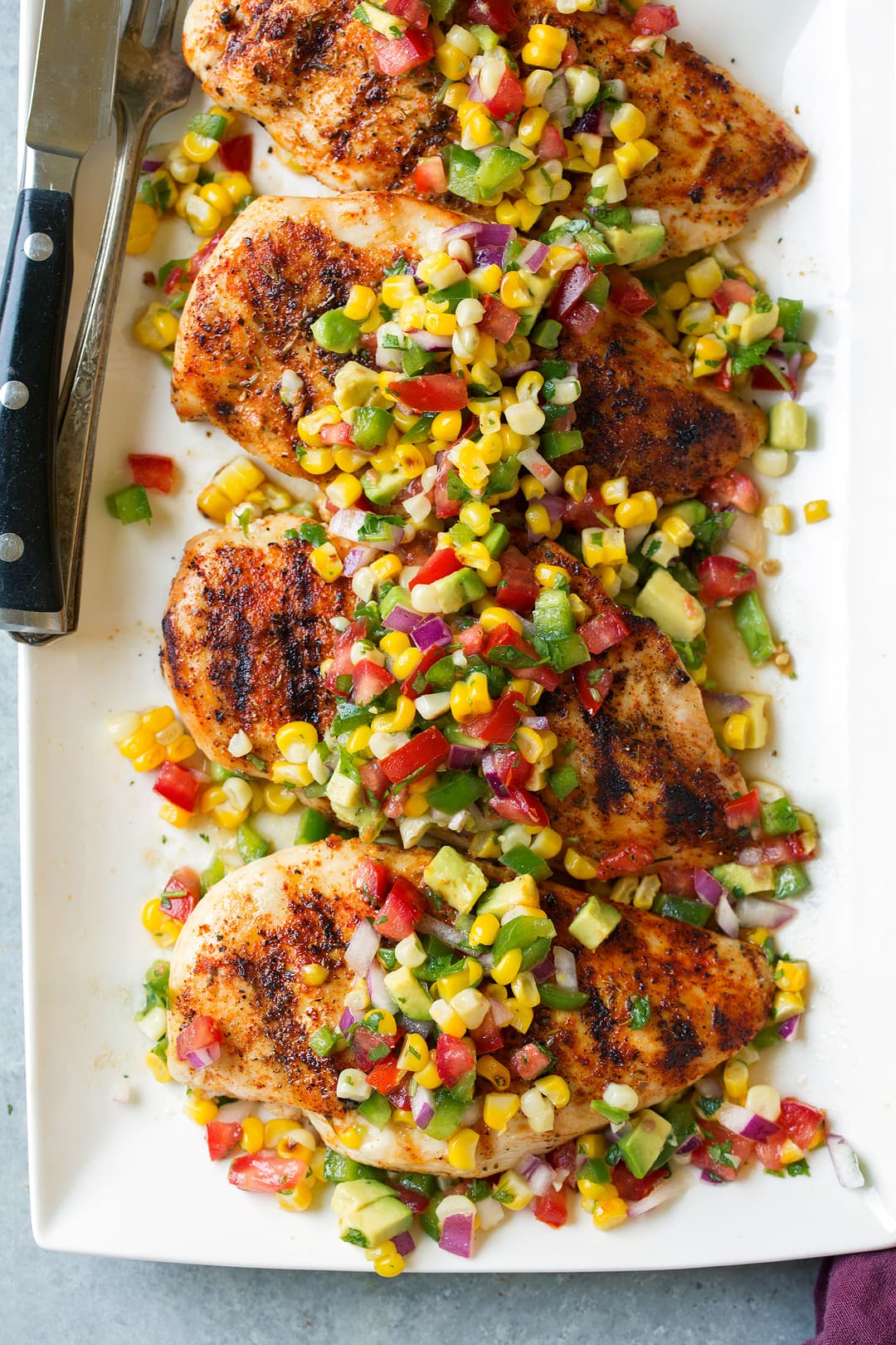 Grilled Cajun-Spiced Chicken with Corn and Tomato Salad