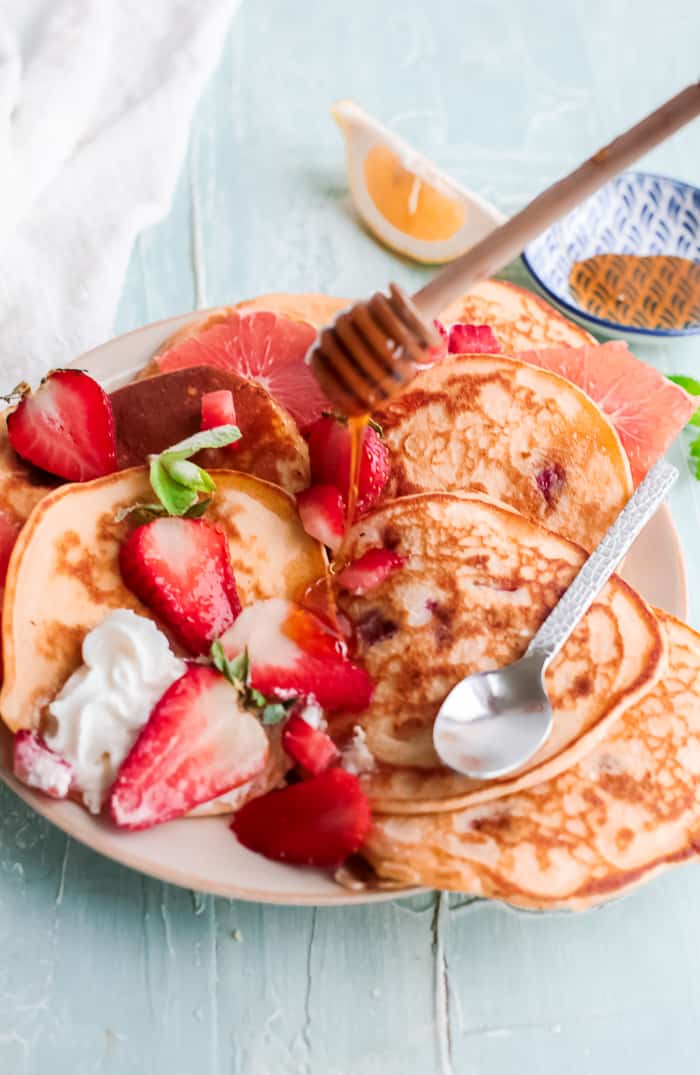 Strawberry-Ricotta Pancakes with Honey and Mint