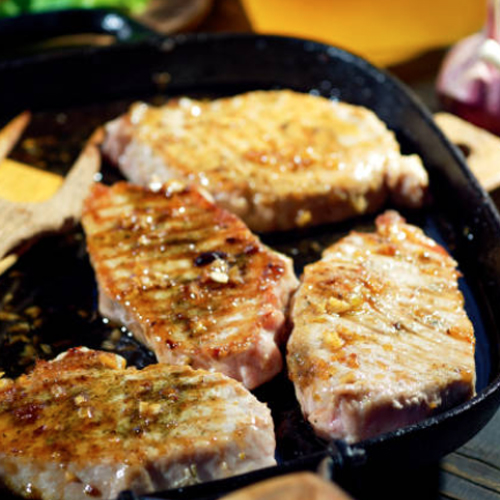 Honey-Garlic Glazed Pork Chops with Green Onion Garnish