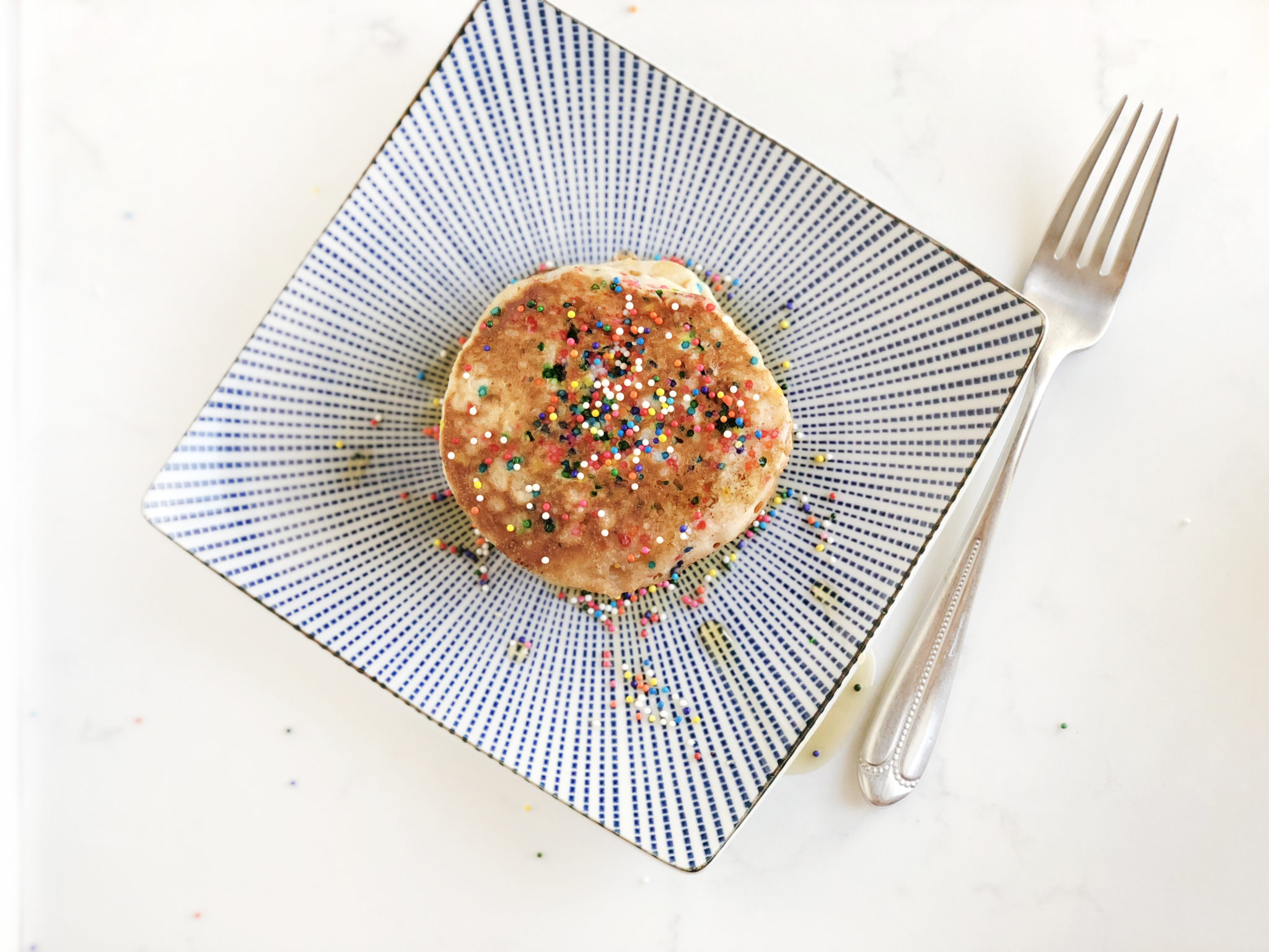 Rainbow Sprinkle Pancake Stack with Vanilla Yogurt Drizzle