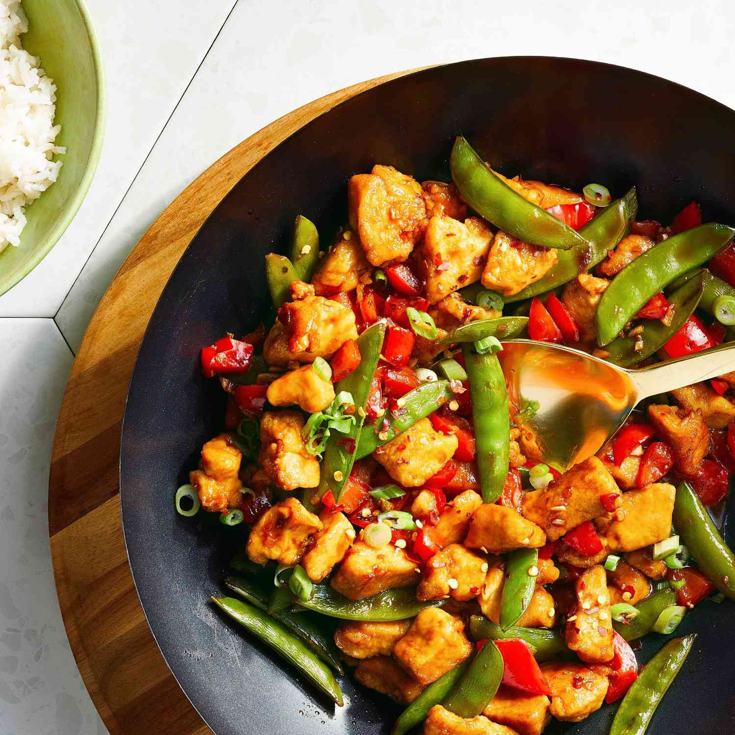 Spicy Chicken Stir-Fry with Snap Peas and Bell Peppers