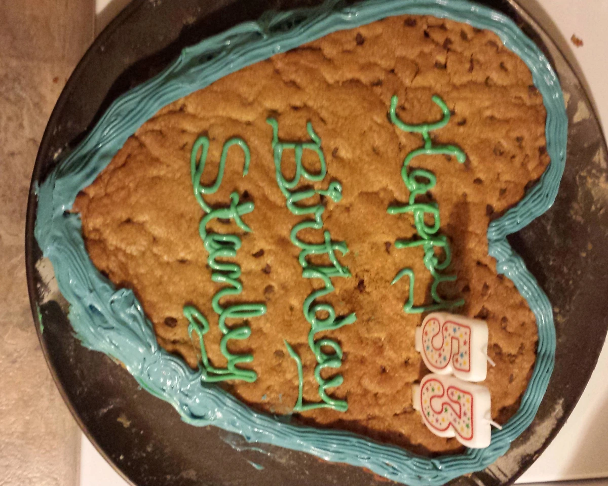 Soft Heart-Shaped Chocolate Chip Cookie Cake with Pink Buttercream and M&Ms