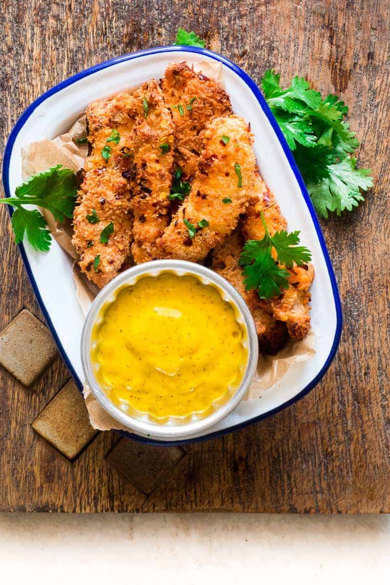Baked Coconut-Crusted Chicken Tenders with Spicy Mango Salsa