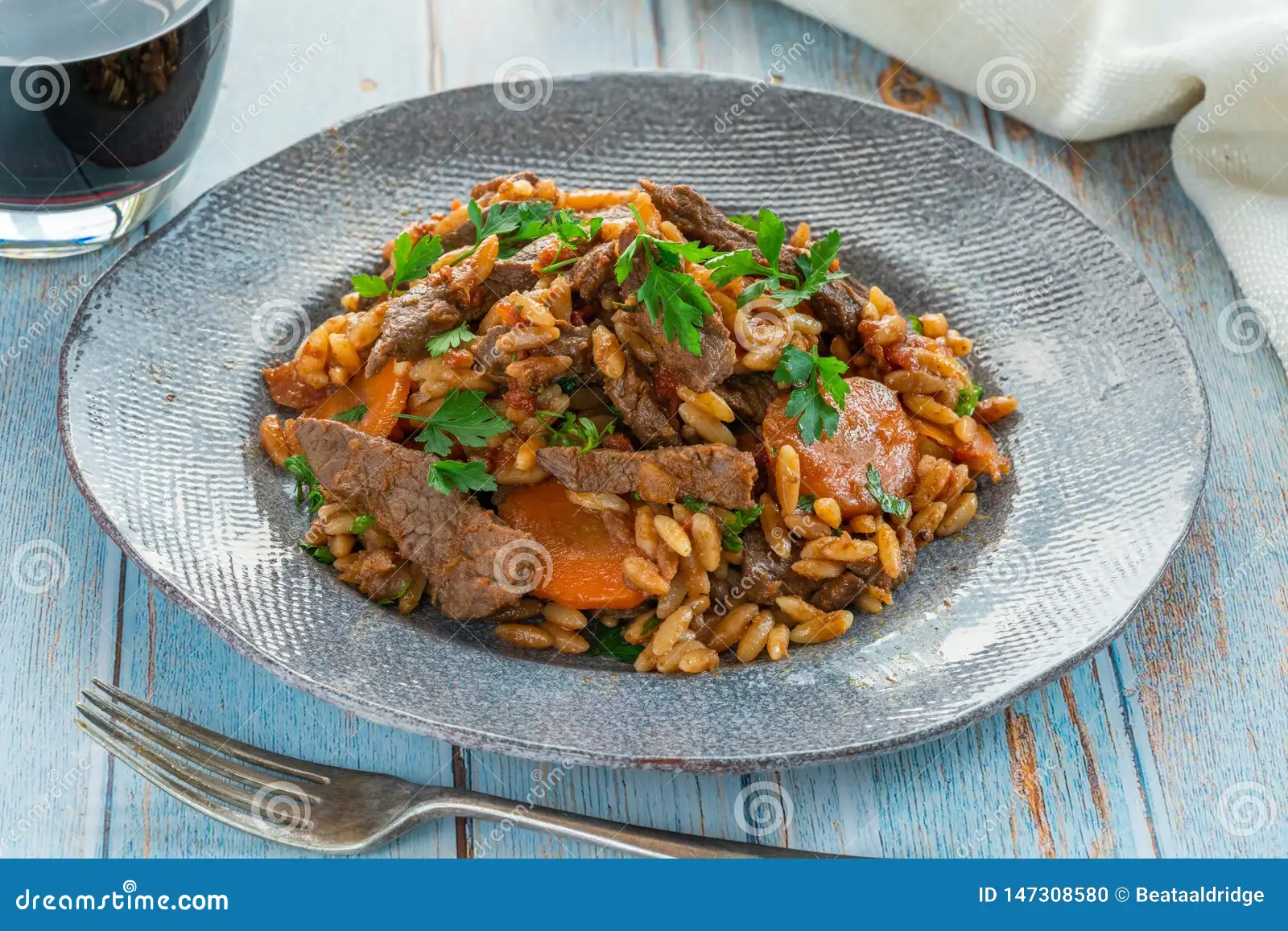 Baked Orzo Giouvetsi with Beef and Tomato Sauce