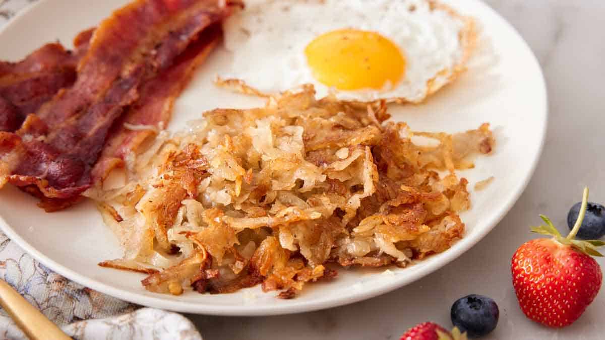 Pan-Seared Texas Bacon and Over-Easy Eggs with Hash Browns