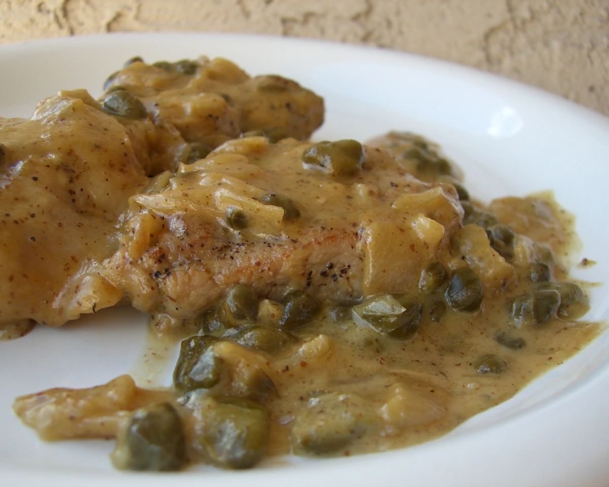 Sautéed Pork Medallions with Caramelized Onions and Mustard Sauce