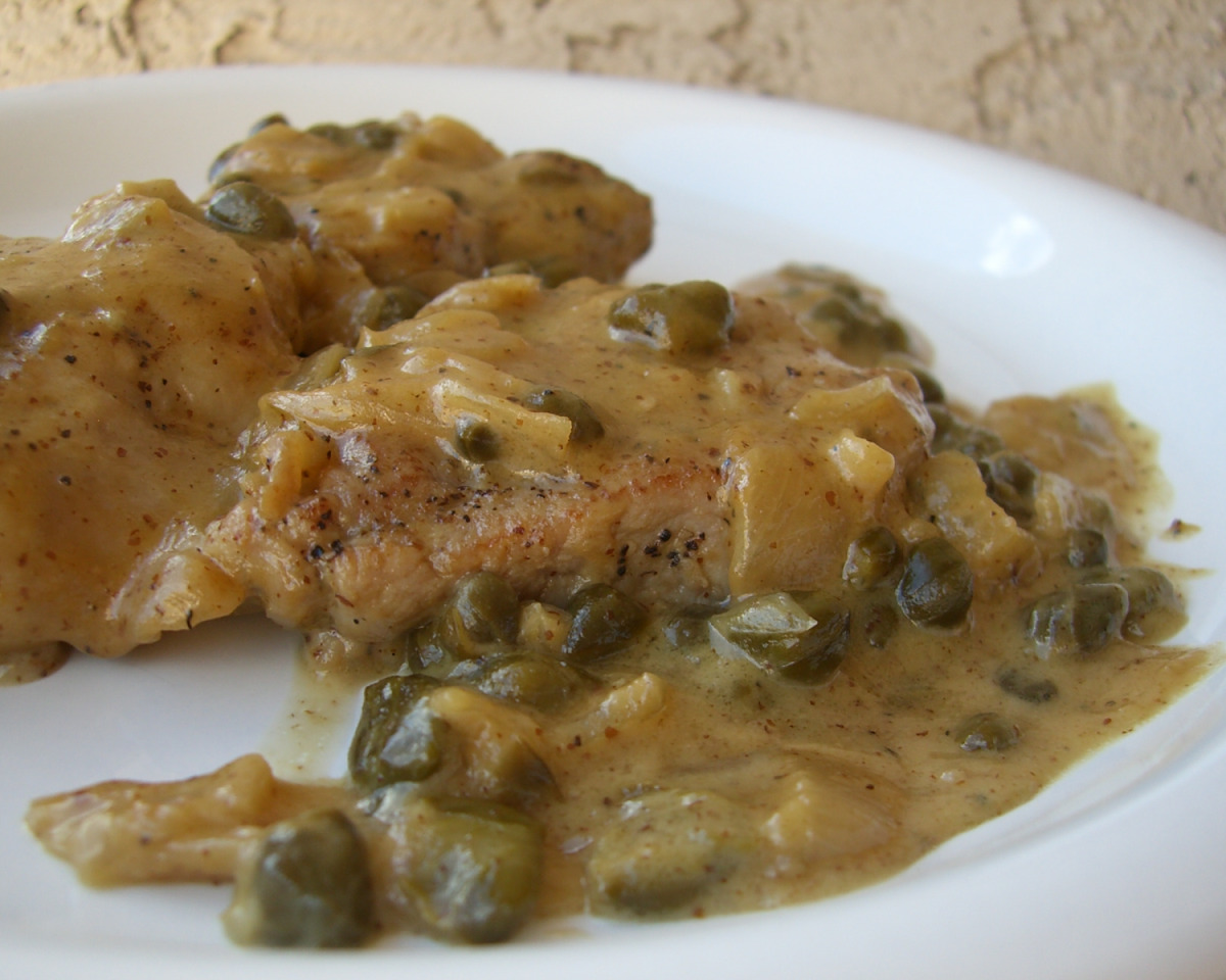 Sautéed Pork Medallions with Caramelized Onions and Mustard Sauce