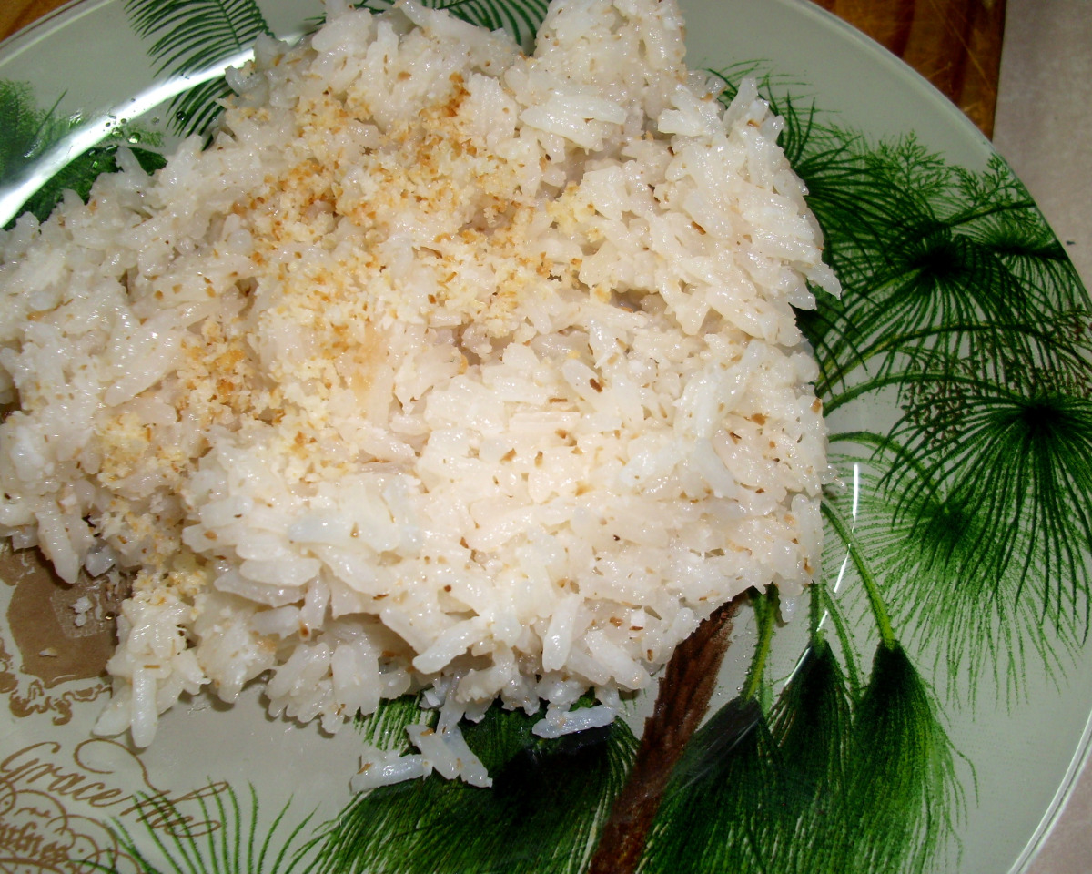 Sweetened Coconut Rice with Toasted Latik Topping