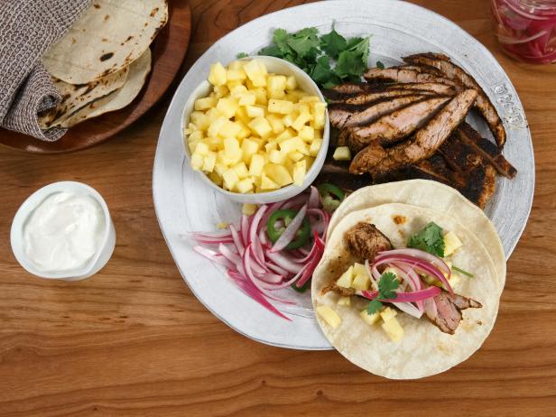 Hidden Network Layer Tacos with Spiced Pork and Pickled Onions