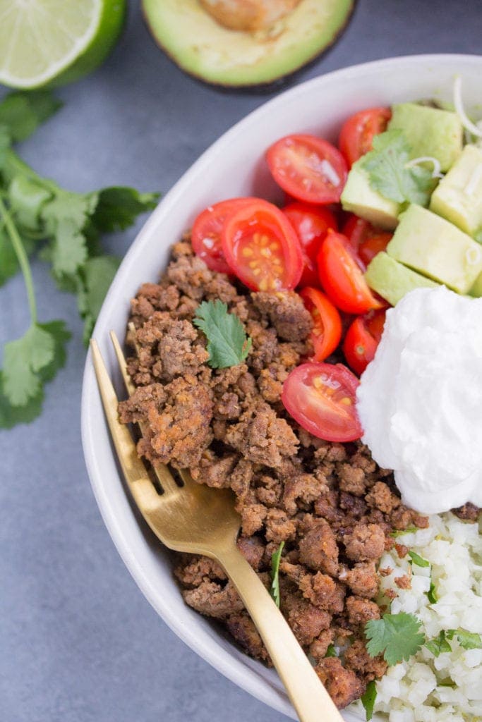 Taco-Seasoned Cauliflower Rice Bowls with Avocado Crema