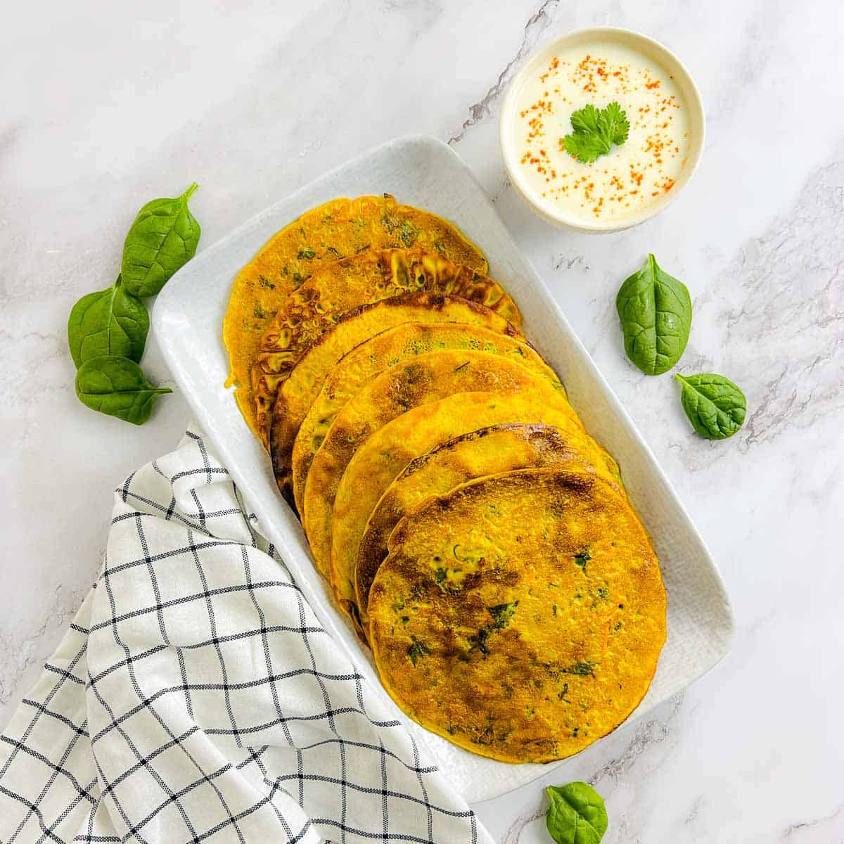 Pan-Fried Spiced Chickpea Flour Pancakes with Yogurt Drizzle