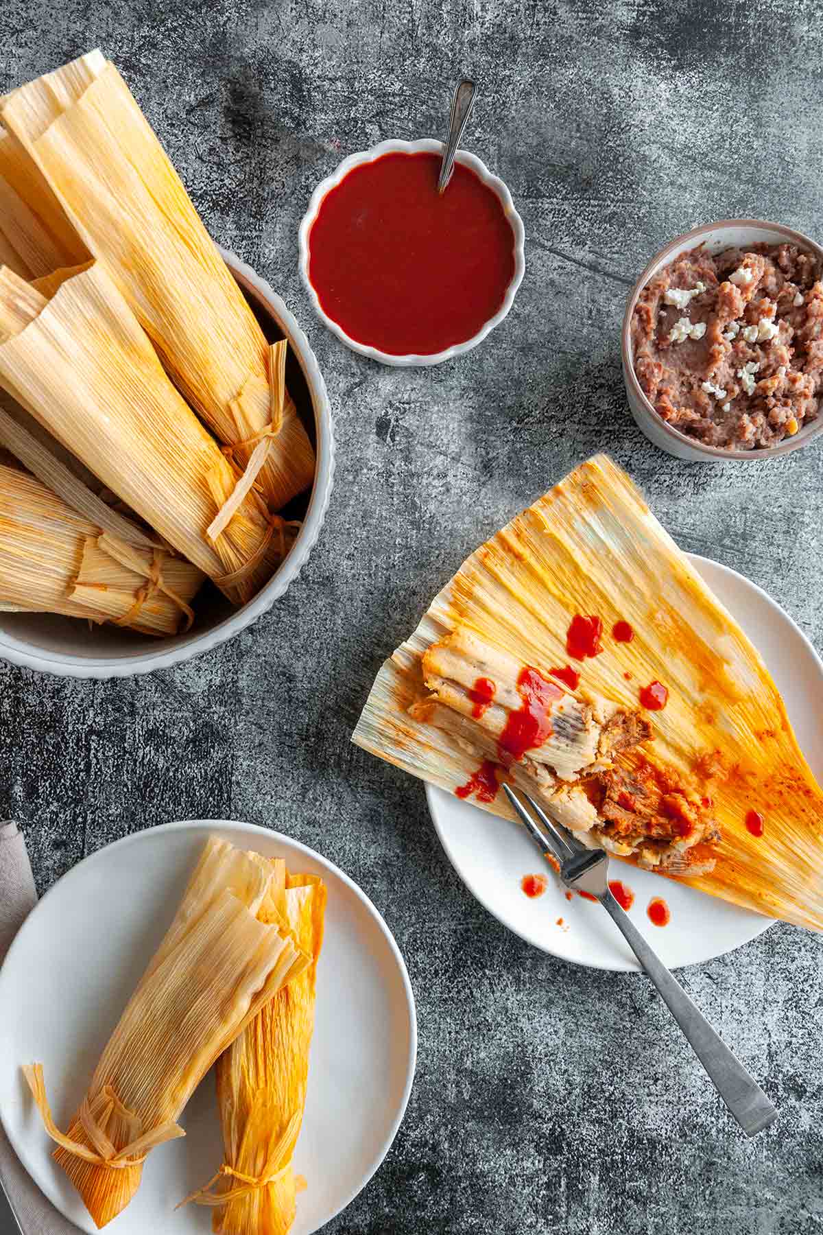 Spiced Pork Tamales with Red Chile Sauce