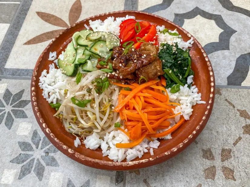 Marinated Beef Bibimbap with Spicy Gochujang Drizzle