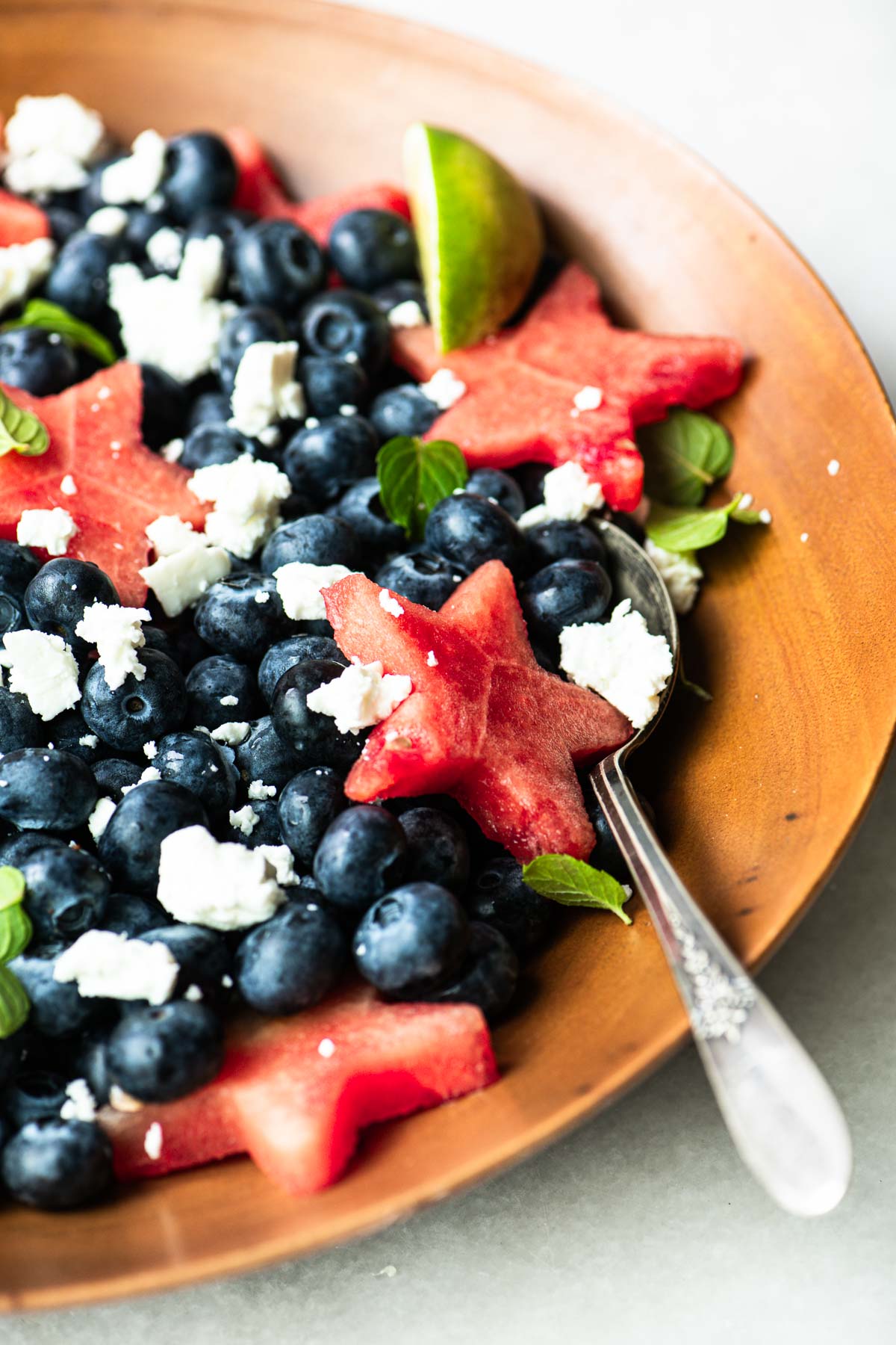 Patriotic Red, White, and Blue Berry Salad with Honey-Lime Dressing