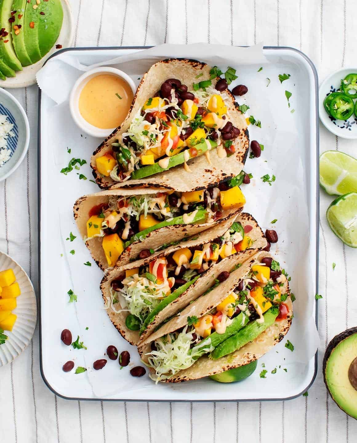 Merry Mango and Black Bean Tacos with Lime Crema