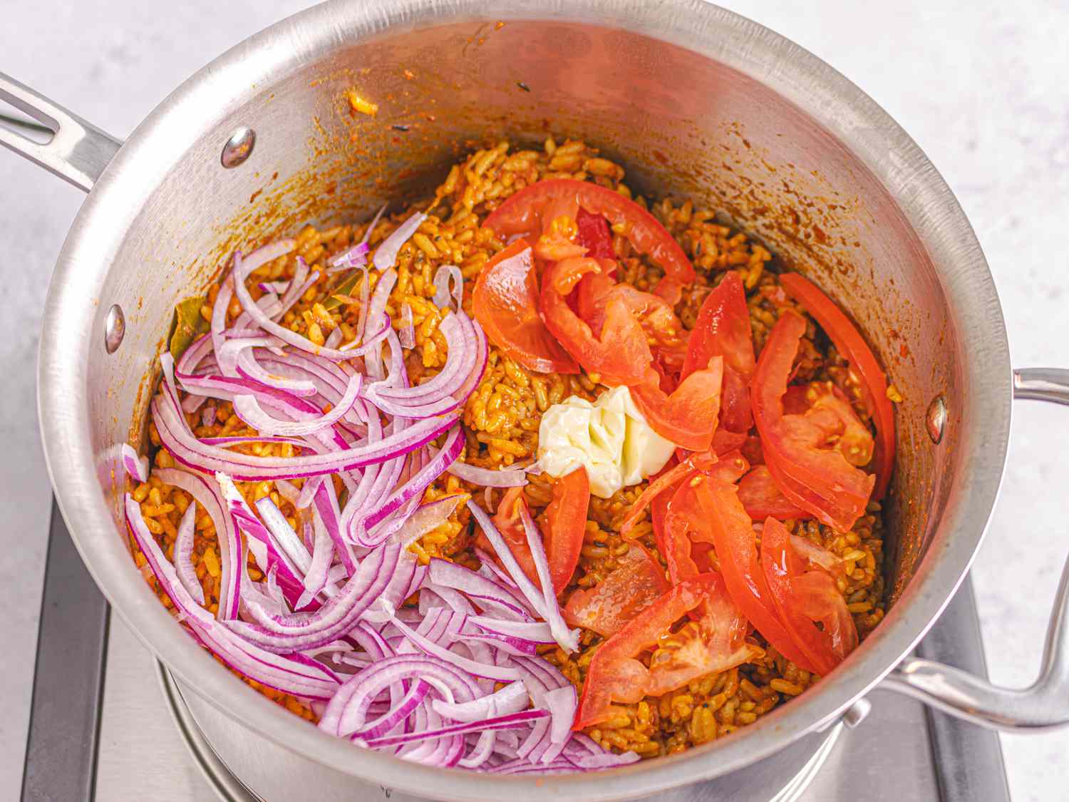 Slow-Cooked Nigerian Jollof Rice with Tomato and Bell Pepper