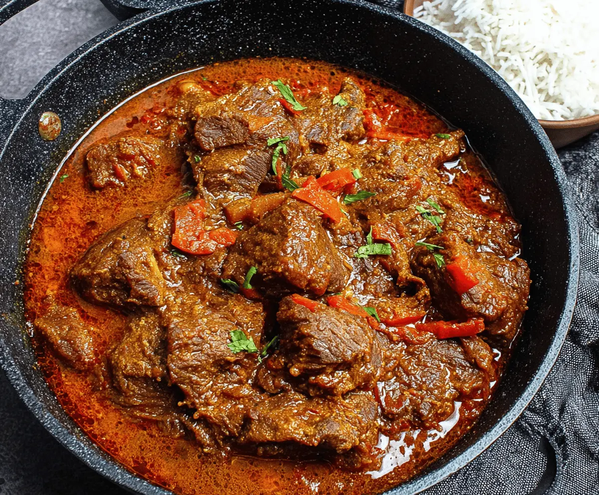 Slow-Cooked Spicy Nigerian Beef Stew with Tomato and Scotch Bonnet
