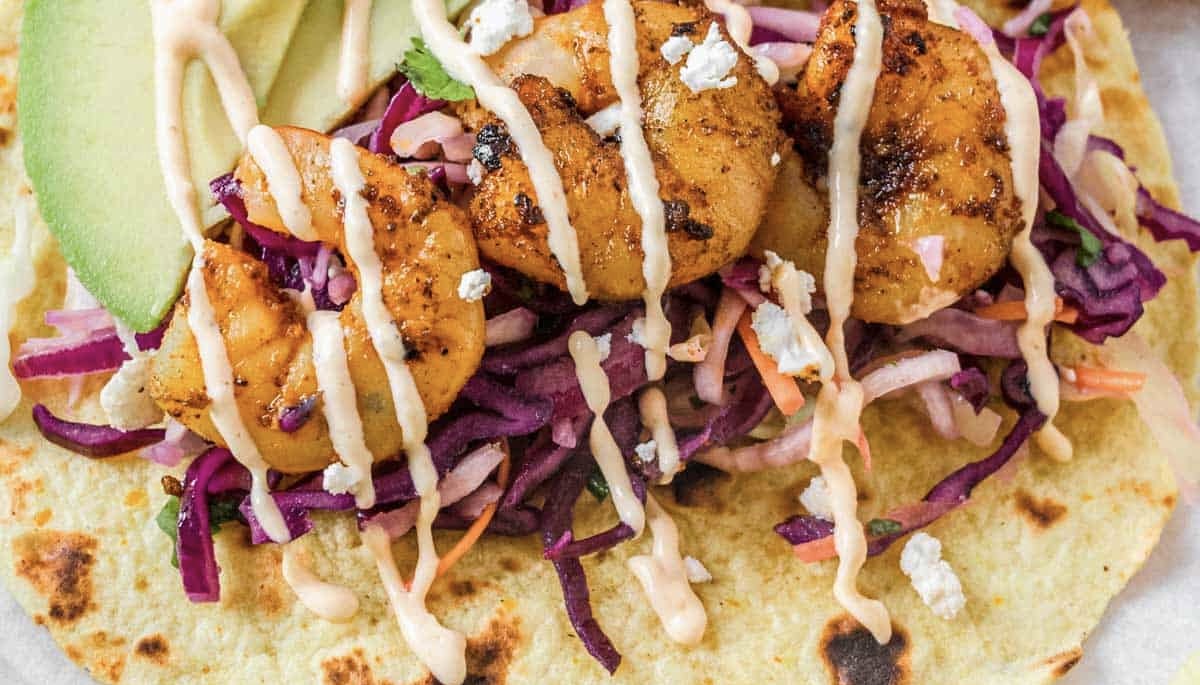 Sautéed Shrimp Tacos with Avocado Lime Crema and Cabbage Slaw
