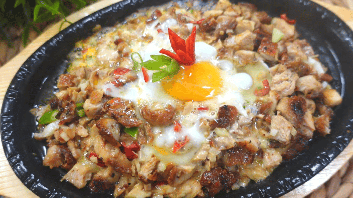 Sautéed Chicken Sisig with Onions and Chili