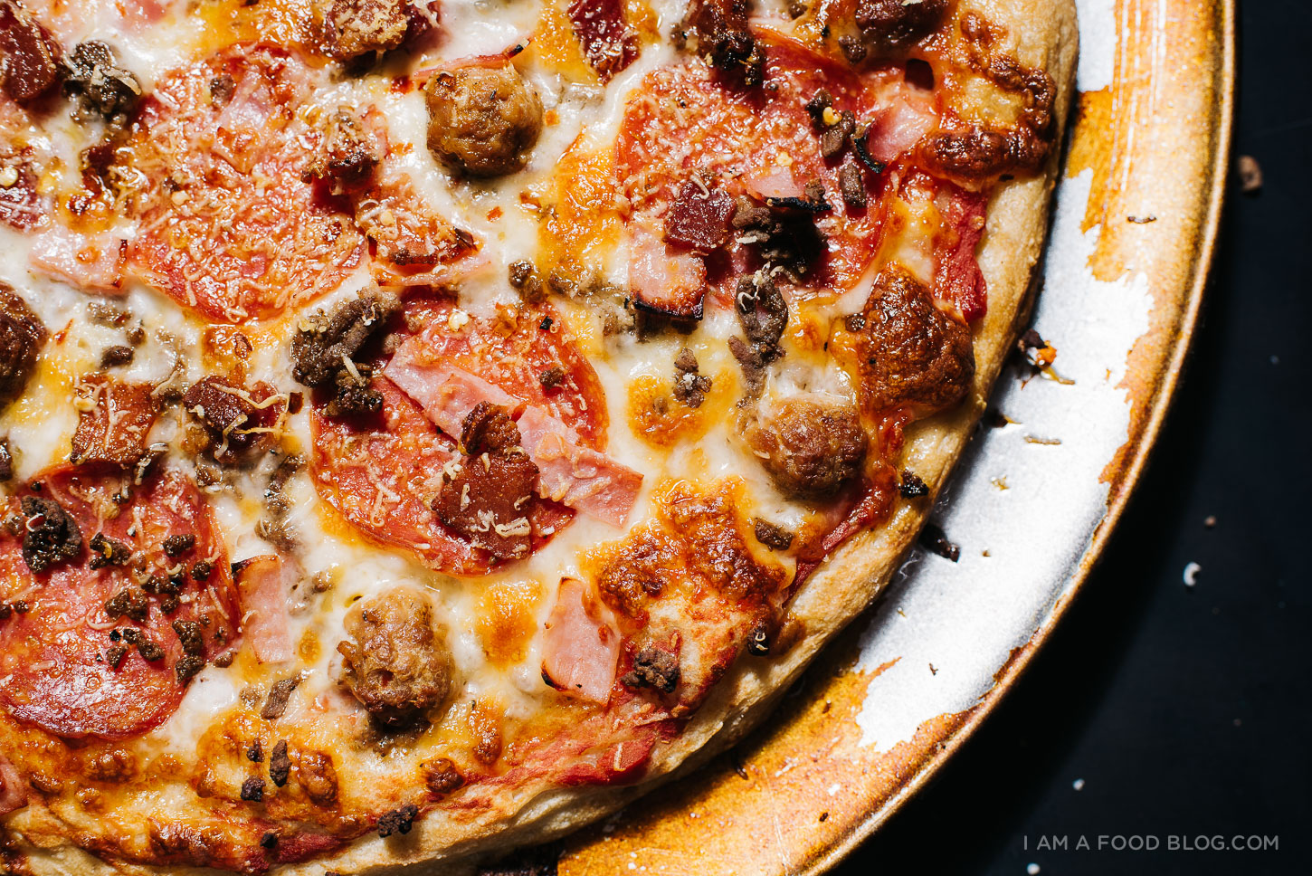 Loaded Meat Lover’s Deep Dish Pizza with Sausage and Bacon