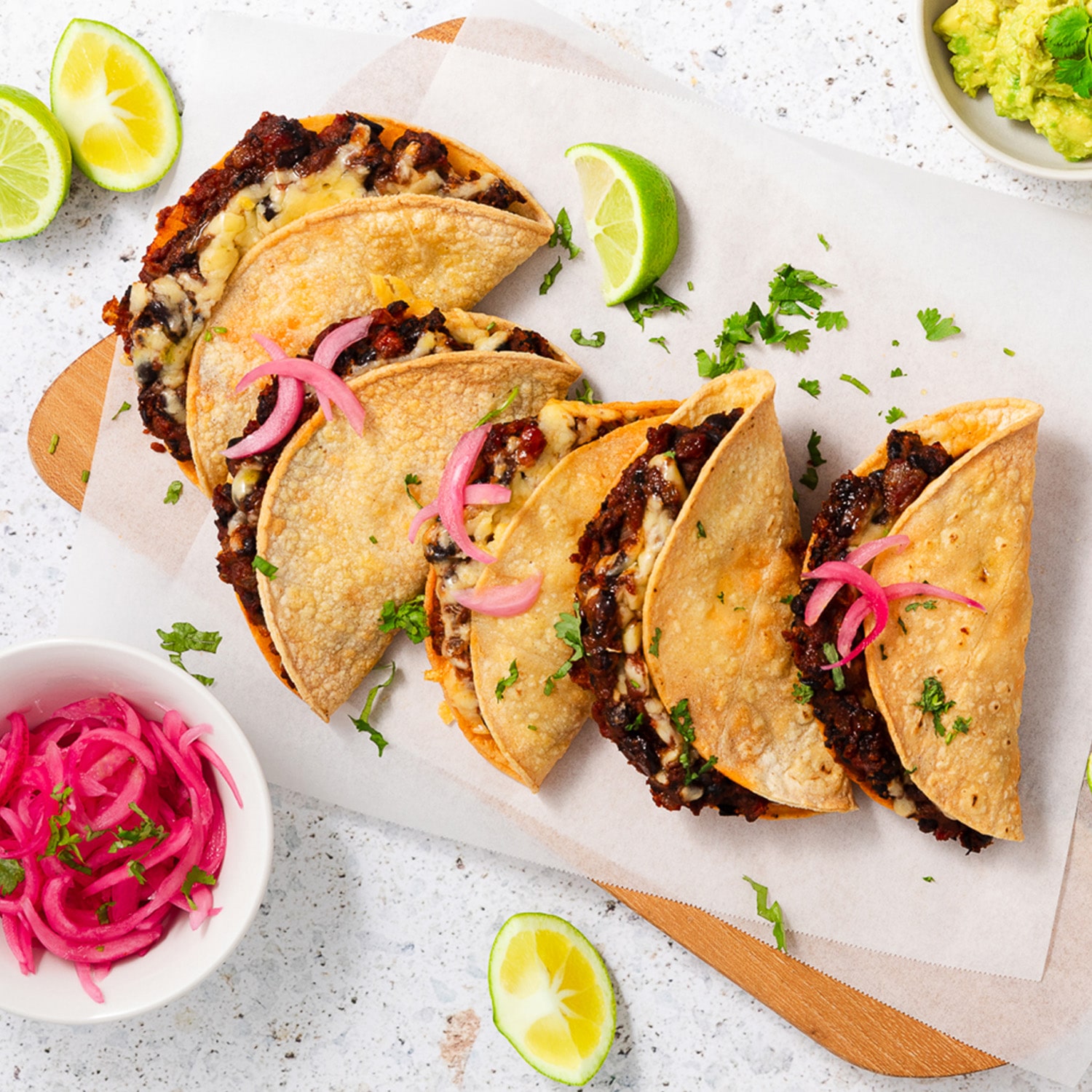 Citrus-Spiced Black Bean Tacos with Pickled Red Onion