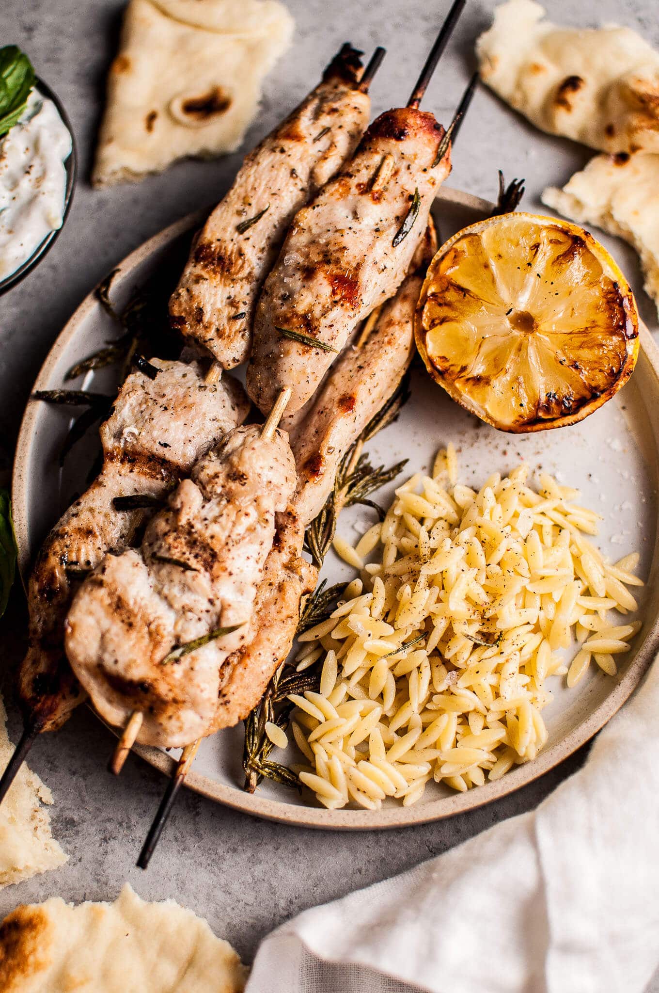 Grilled Lemon-Rosemary Chicken Skewers with Garlic Yogurt Sauce