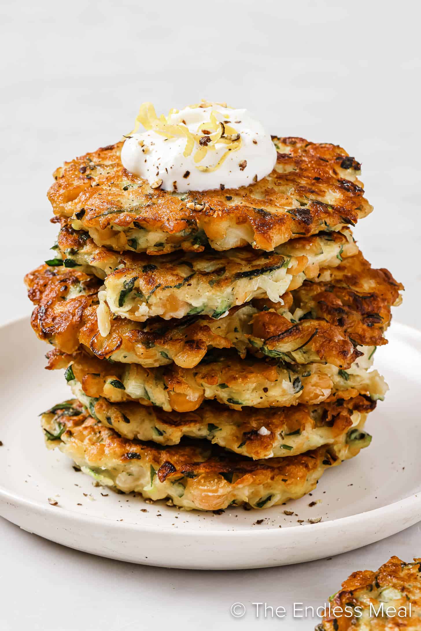 Baked Zucchini and Chickpea Patties with Garlic Yogurt Sauce
