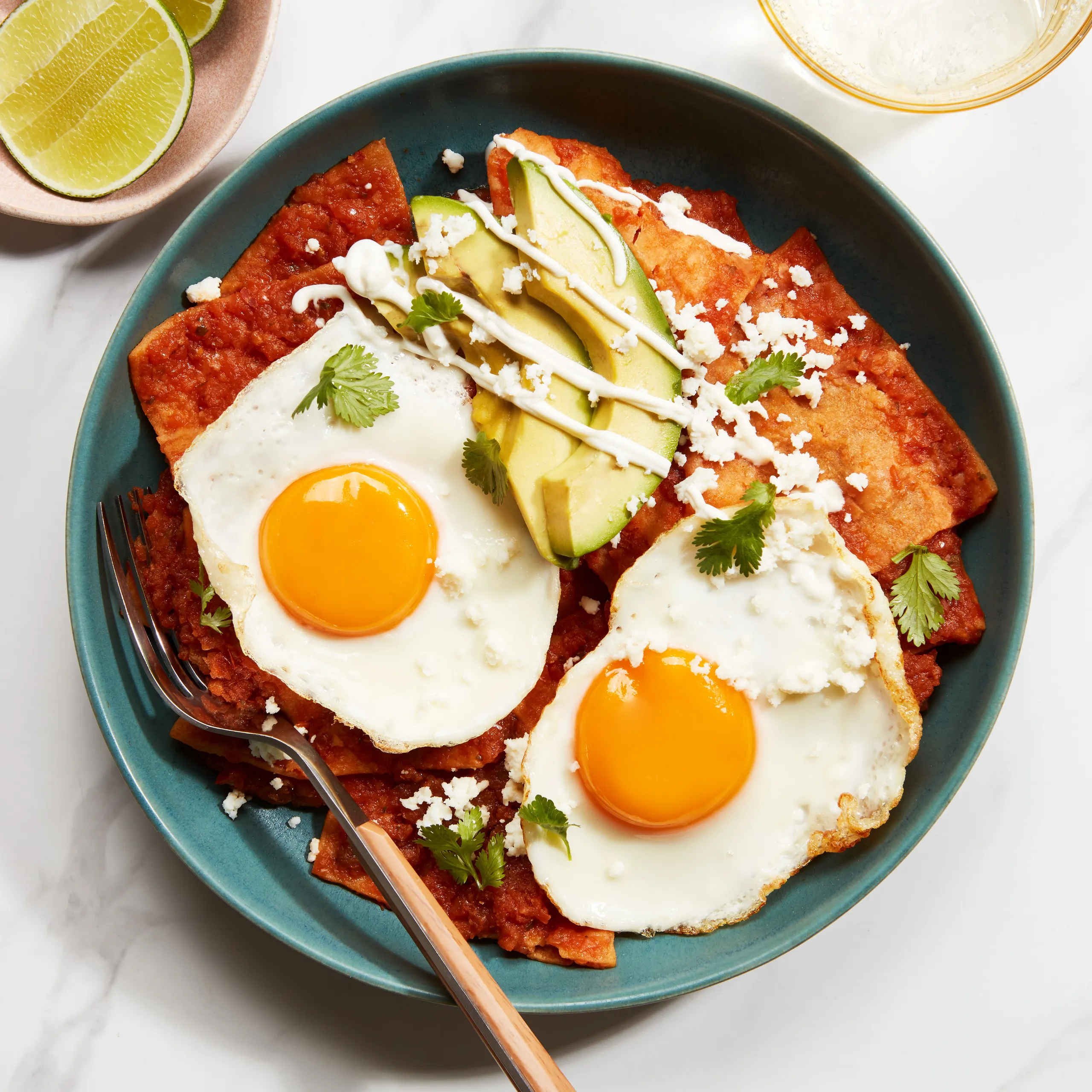 Chilaquiles Rojos with Crispy Tortilla Chips and Fresh Queso Fresco