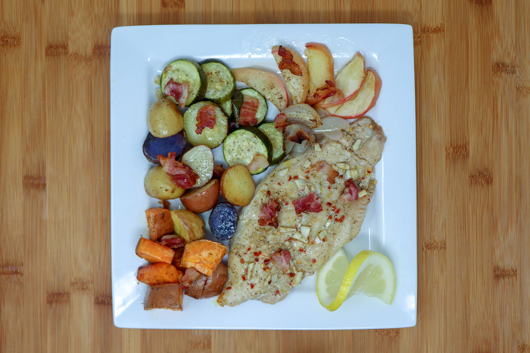 Sheet Pan Cajun-Spiced Catfish with Roasted Vegetables
