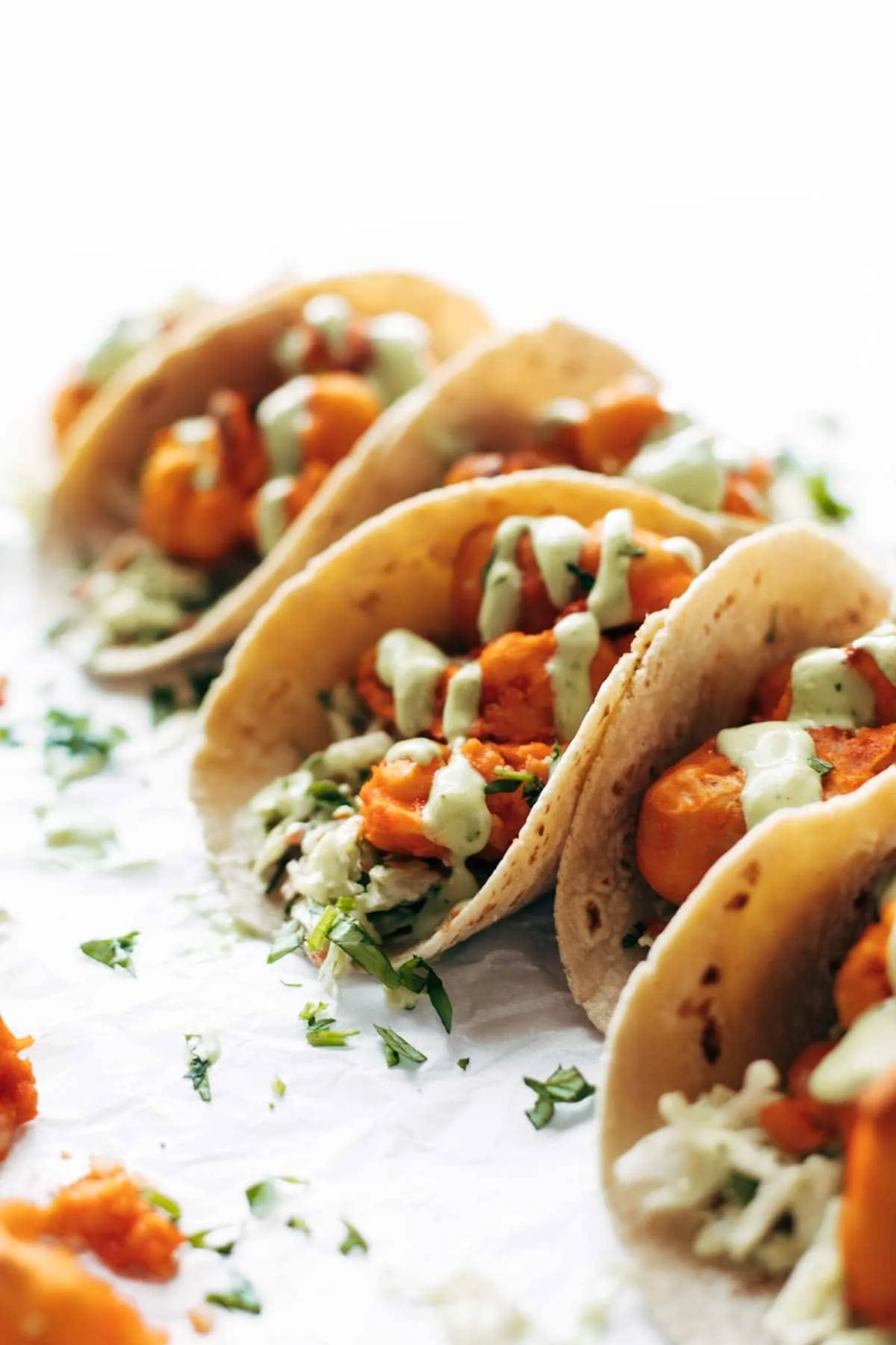 Buffalo-Inspired Roasted Cauliflower Tacos with Spicy Lime Crema