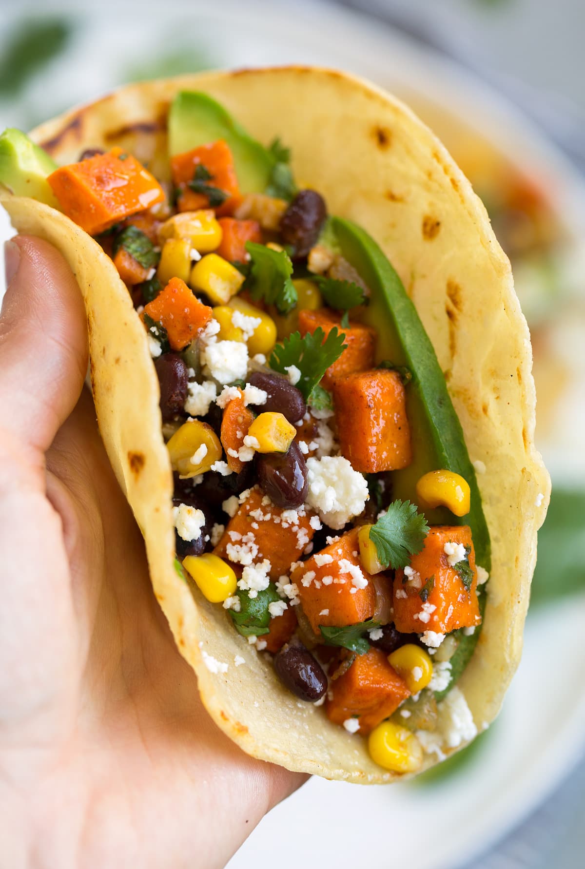 Oven-Roasted Sweet Potato and Black Bean Tacos with Cilantro Lime Slaw