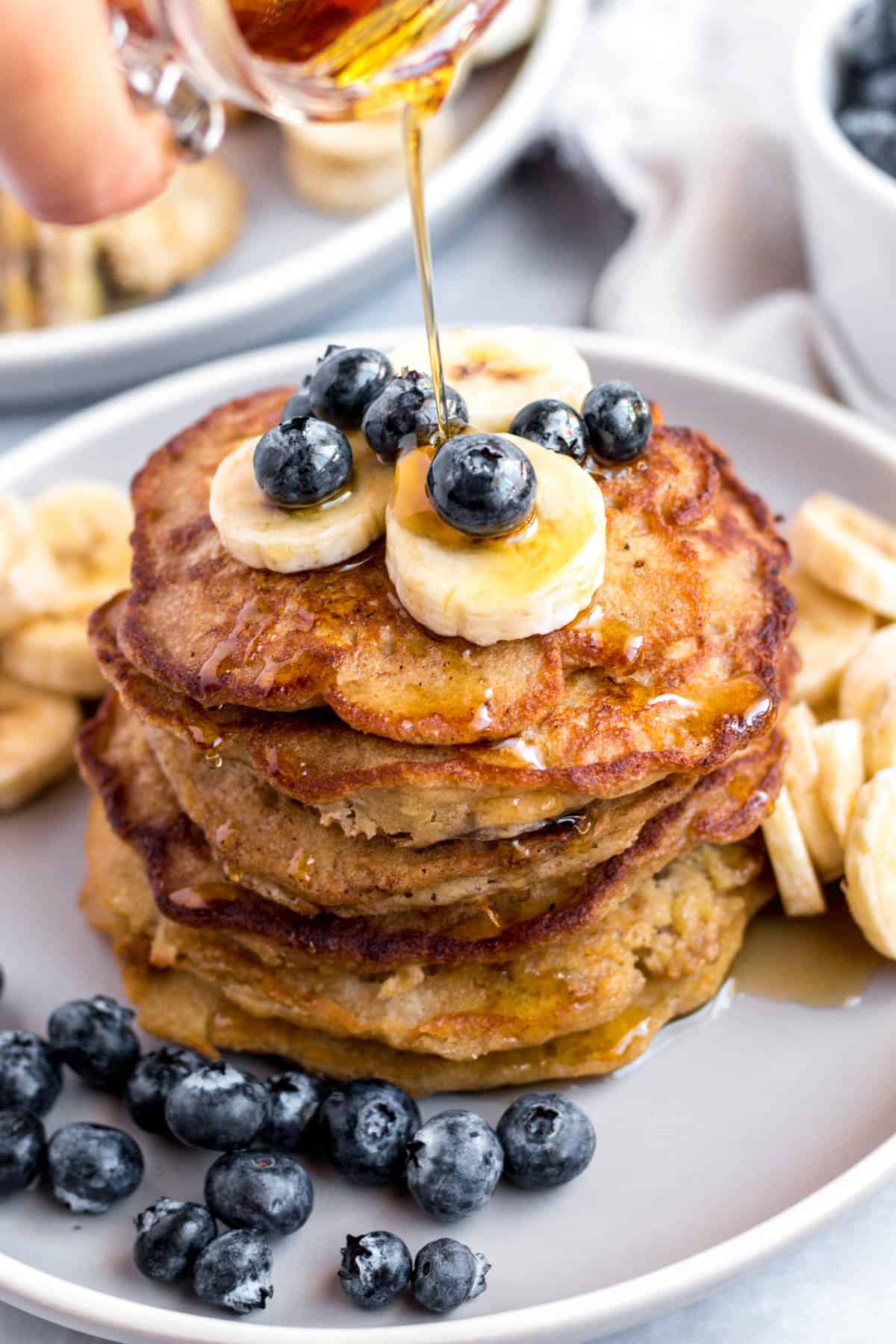 Kid-Friendly Banana Oat Pancakes with Blueberry Sauce