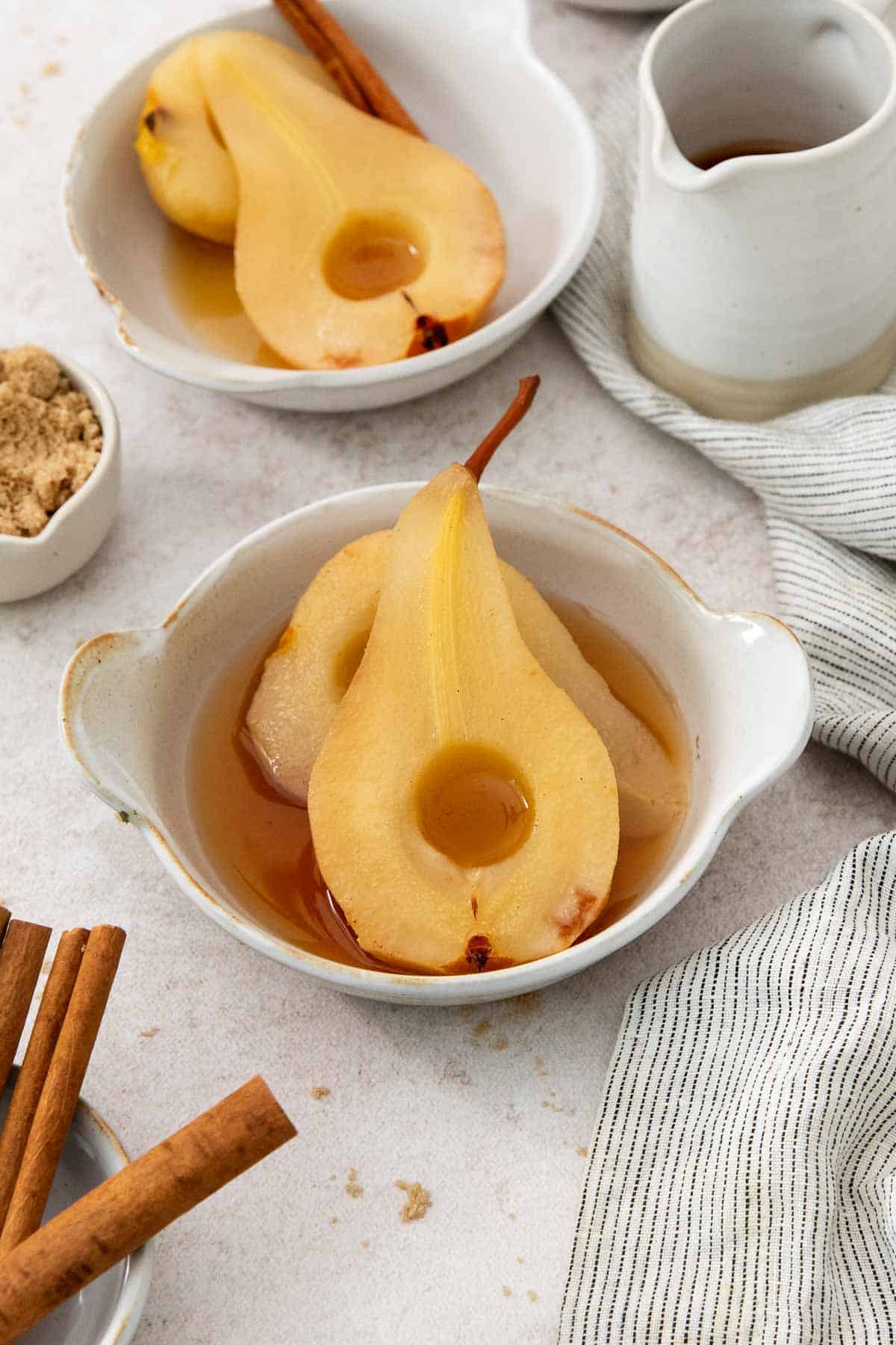 Chilled Moscato Poached Pears with Spiced Apple Cider Reduction