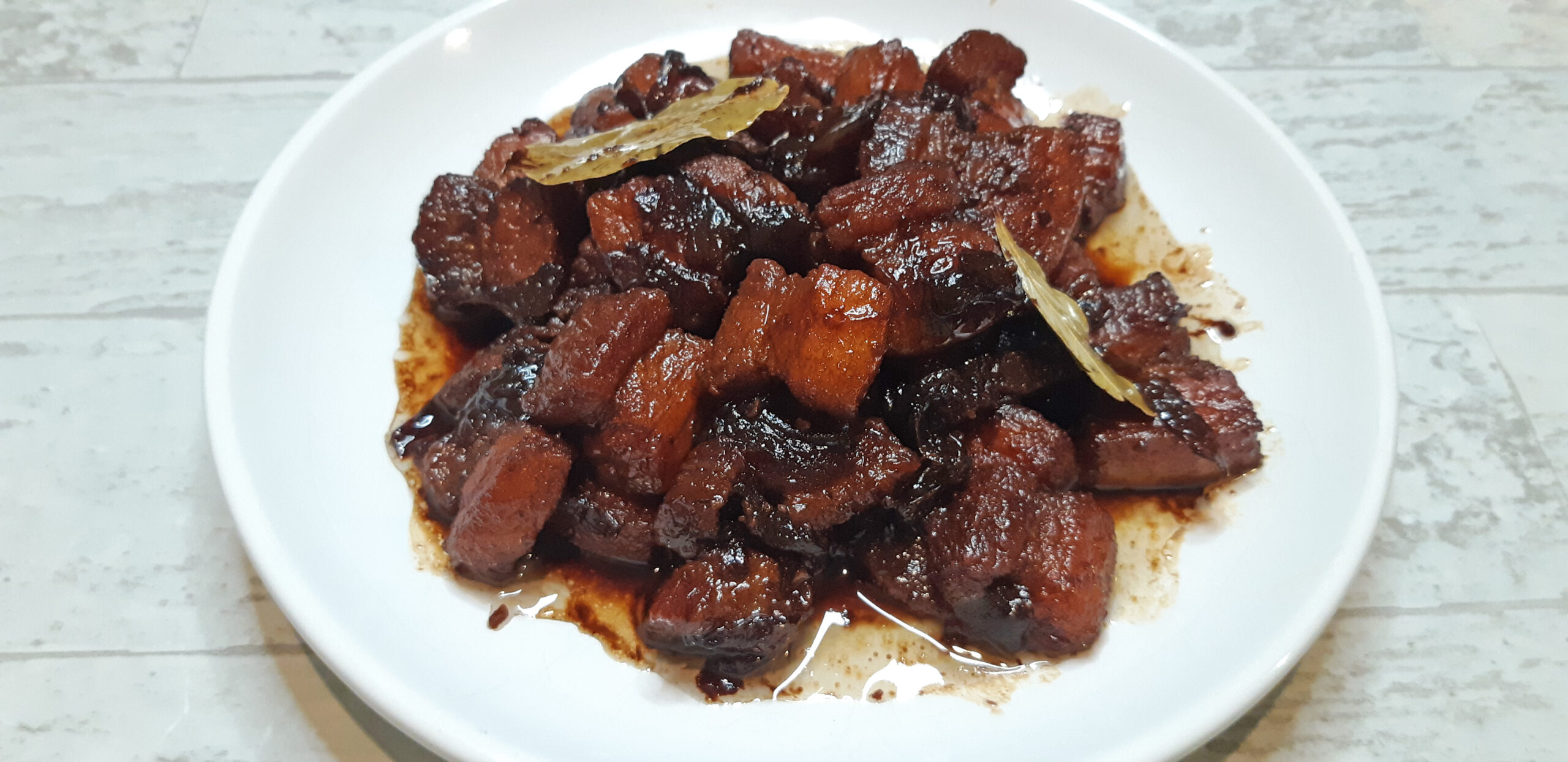 Sautéed Pork Belly Adobo with Garlic and Bay Leaves