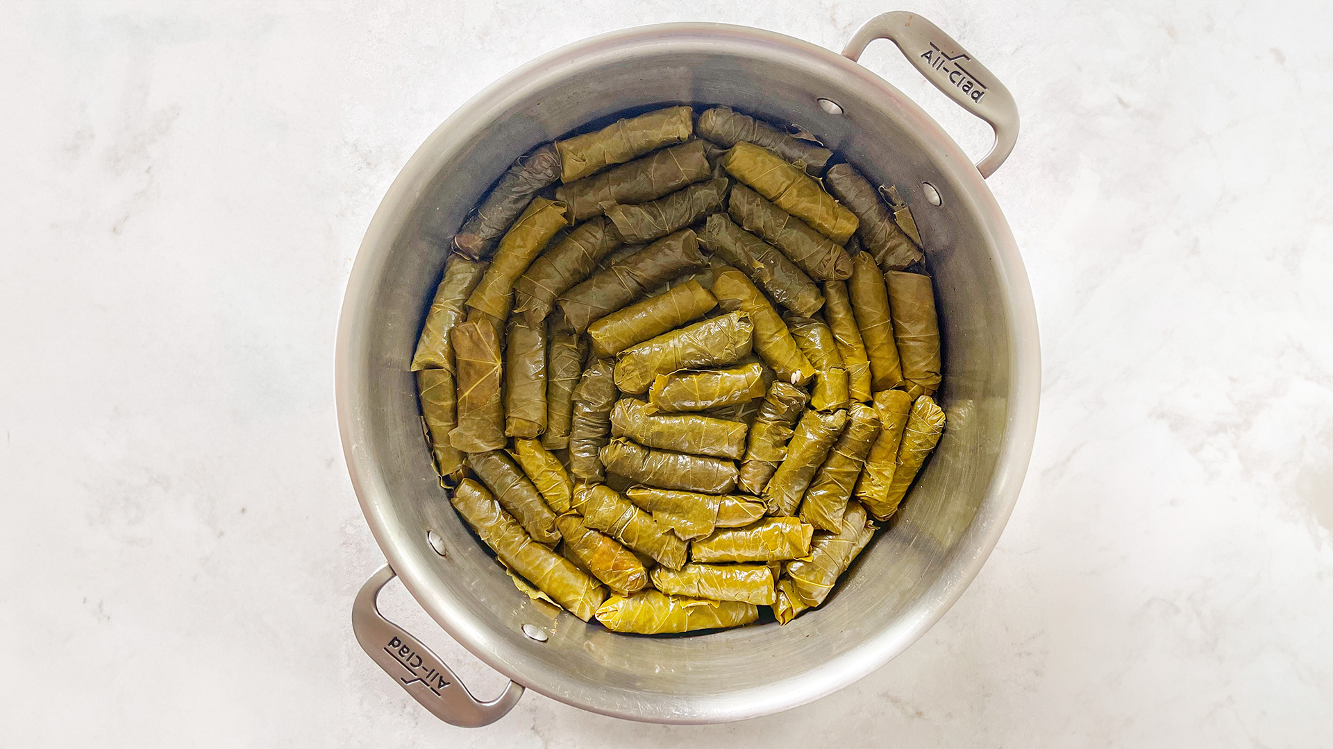 Baked Stuffed Grape Leaves with Lemon and Herbs