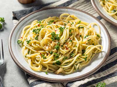 Garlic-Infused Olive Oil Pasta with Fresh Basil and Parmesan