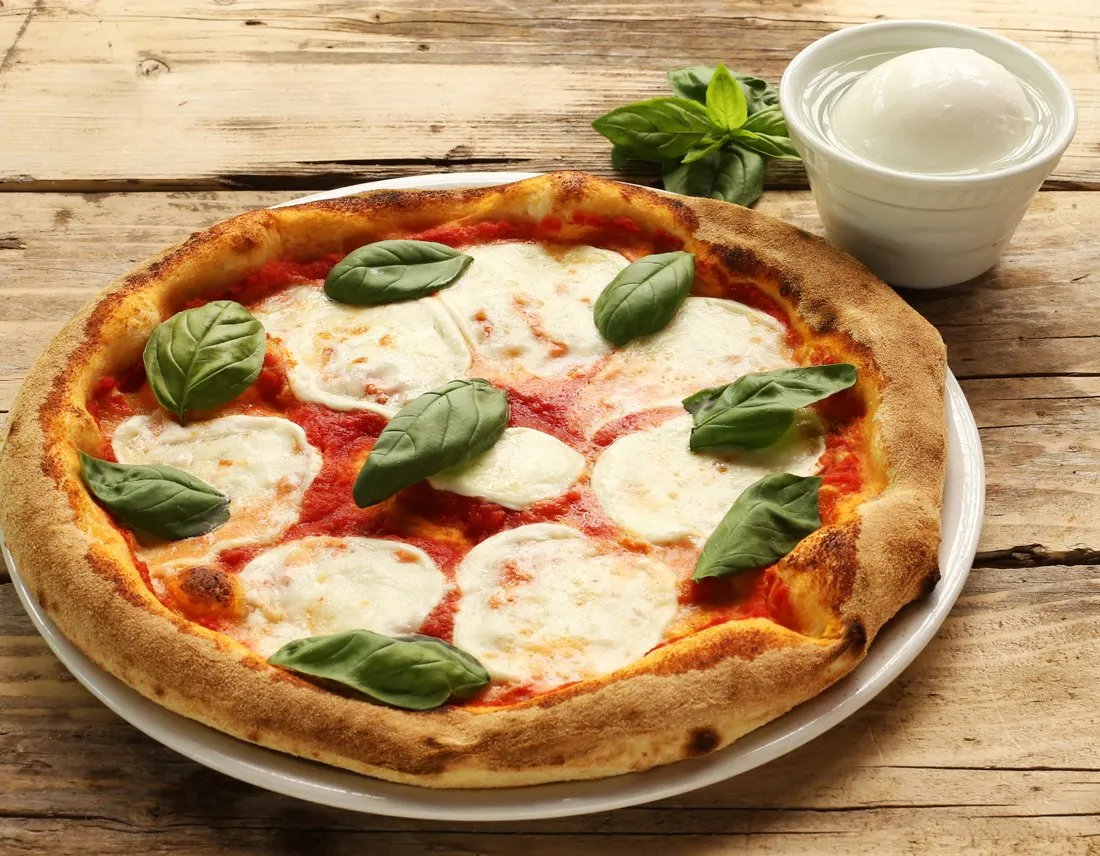 Thin-Crust Margherita Pizza with Fresh Basil and Buffalo Mozzarella