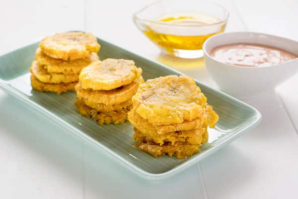 Puerto Rican Tostones with Mojo Garlic Sauce