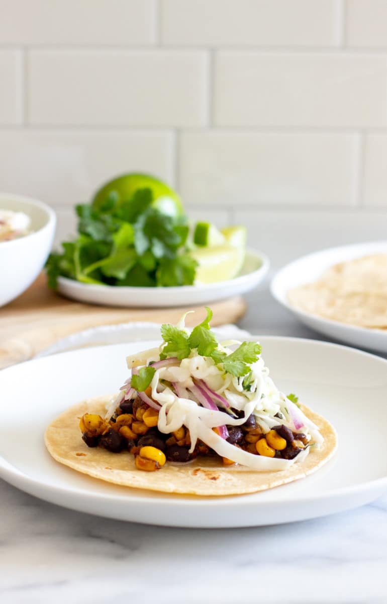 Diverse Ethnic Black Bean and Corn Tacos