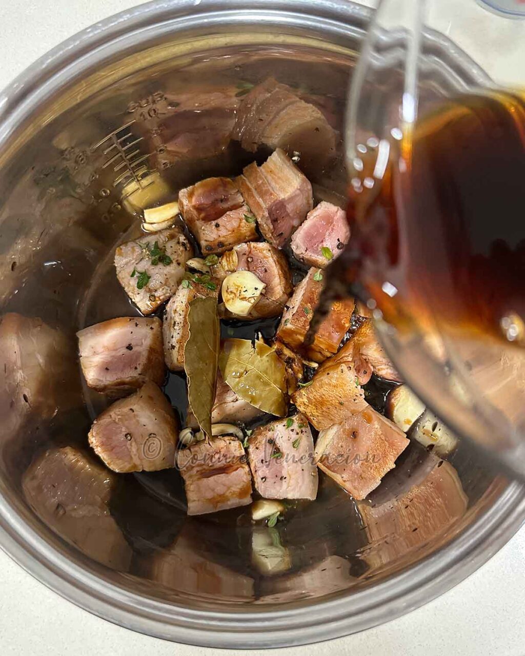 Slow-Simmered Pork Adobo with Black Pepper and Bay Leaves