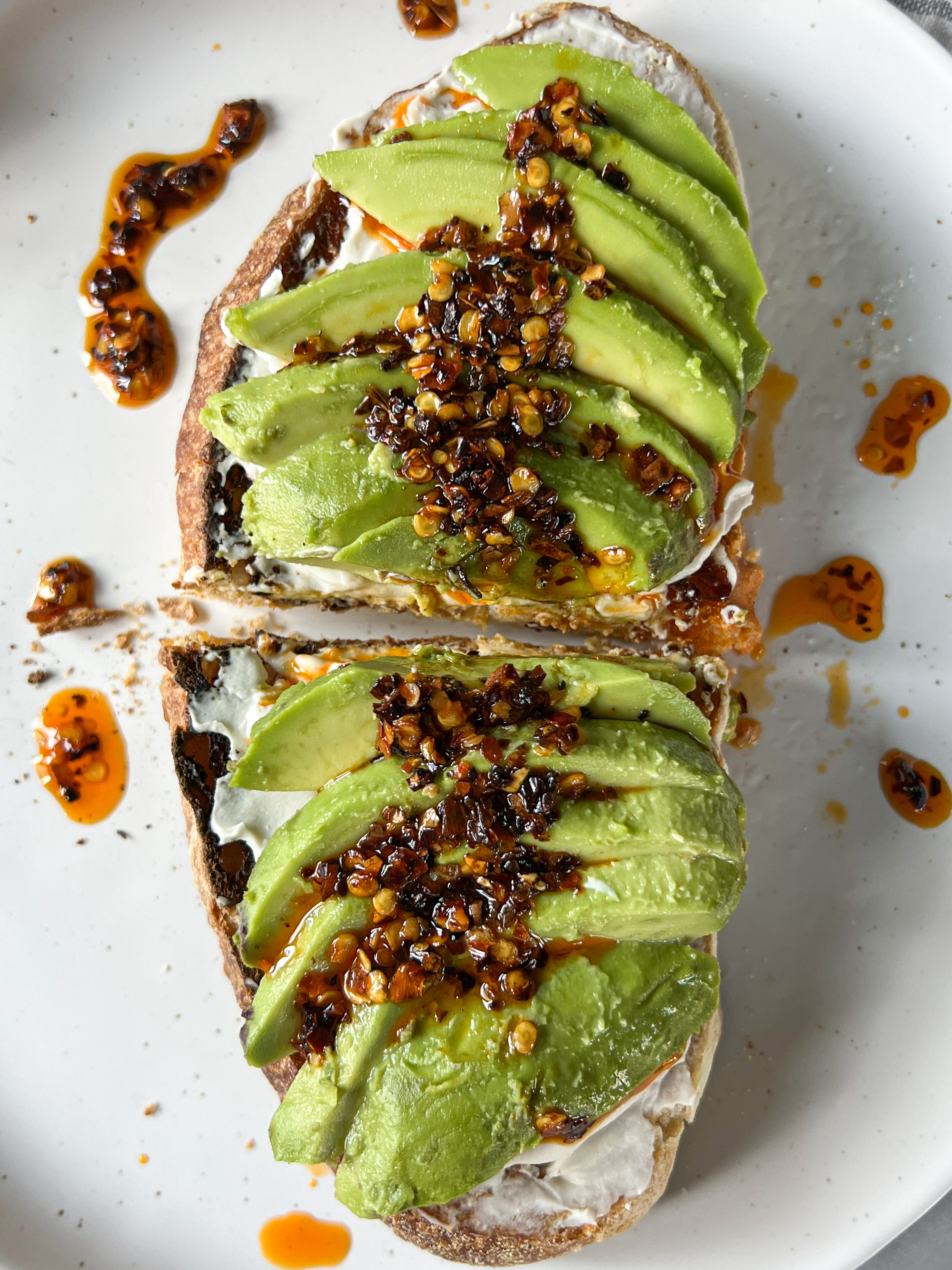 Toasted Sourdough Sandwich with Avocado, Poached Egg, and Chili Oil