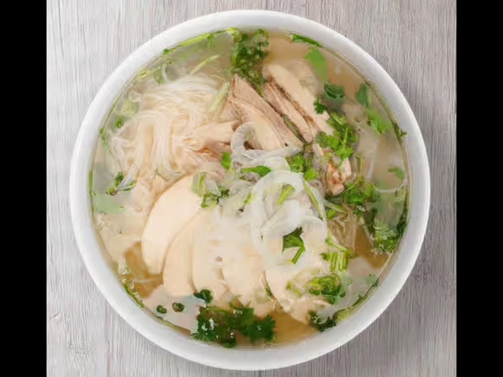 Slow-Simmered Beef Pho Broth with Rice Noodles